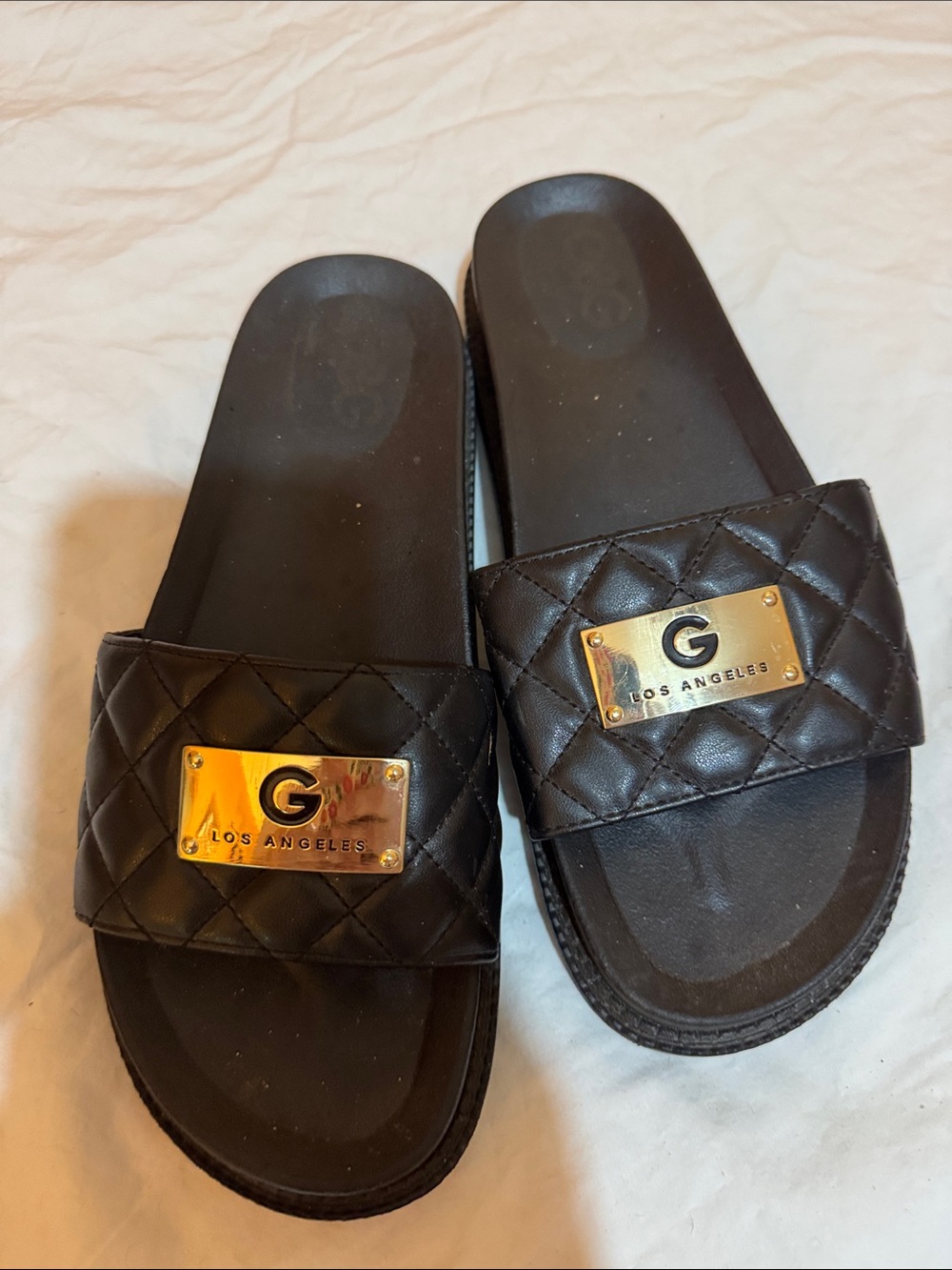 G Los Angeles Quilted Black Slide Sandals with Gold Plaque